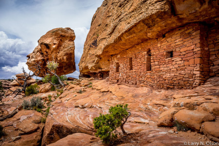 Intricate stonework atop domed rock formation.