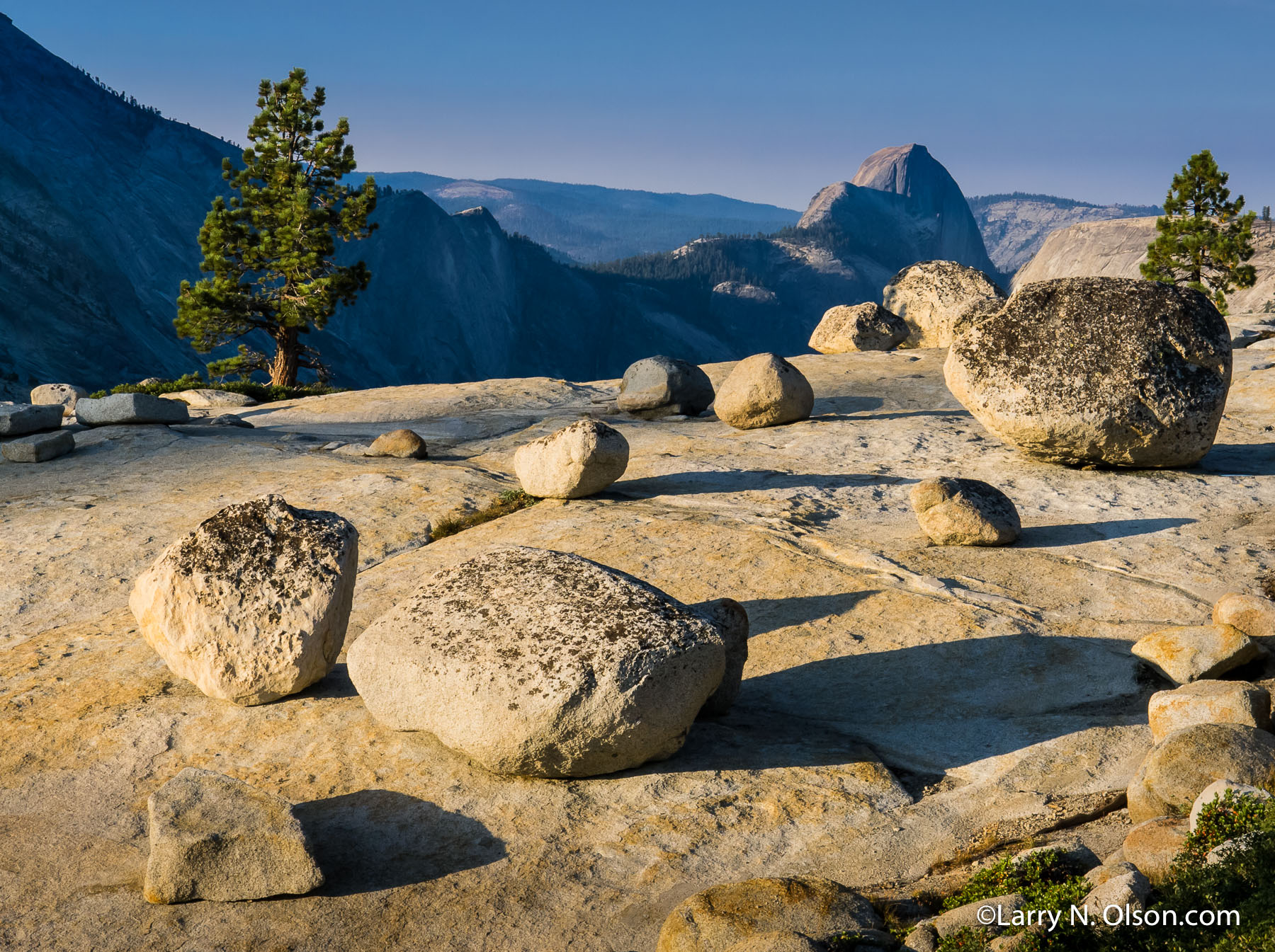 Olmsted Point, Yosemite National Park, Ca. | Glacier erratics (granitic bolders) are left stranded after the last ice age. The peak of Halfdome is far in the disdance.