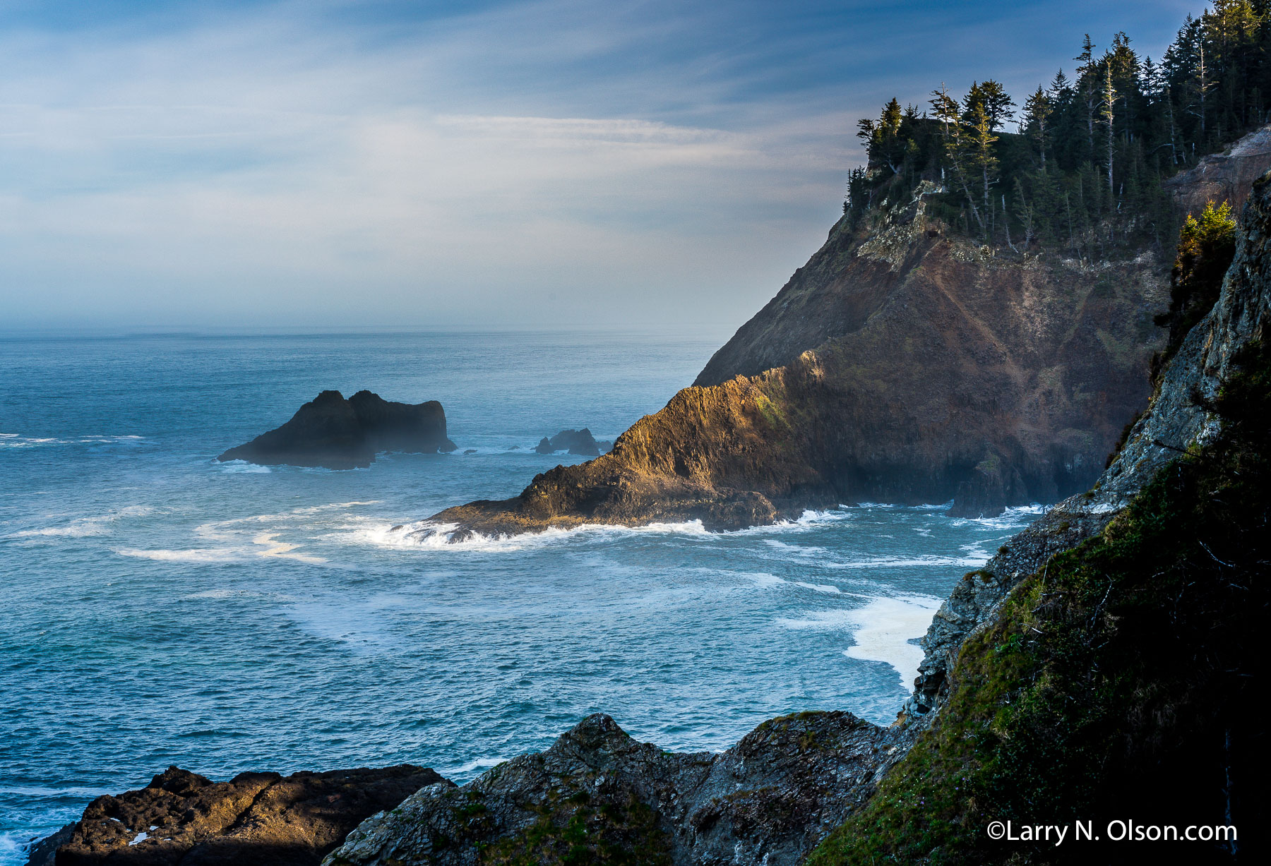 Cape Falcon, Oswald West State Park, Oregon | A beam of sunlight illuminates the dramatic cliffs of Oswald west State Park.