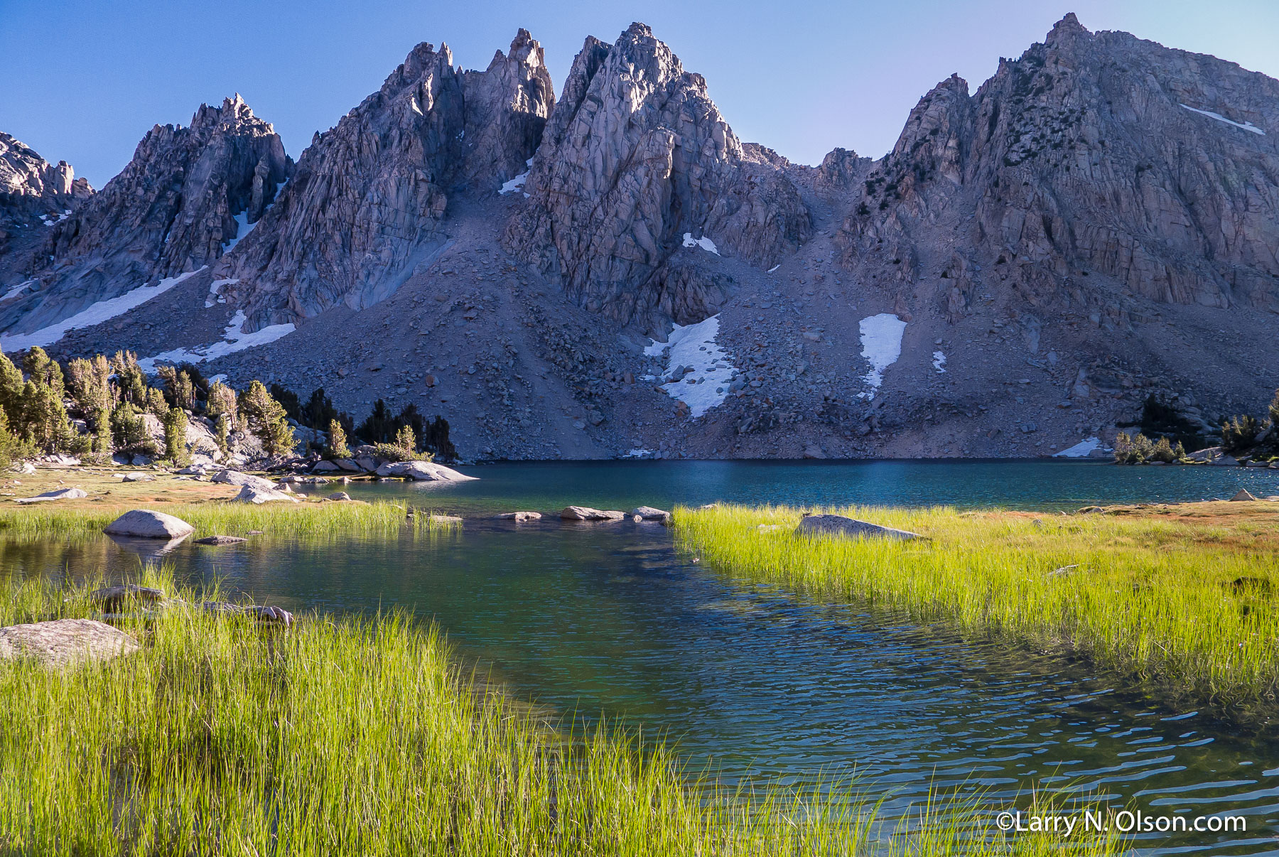 Kearsarge Lake, Kings Canyon National Park, Ca. | The sunrise light shines on the high alpine lakeshore while the Kearsarge Pinnacles remain in shadow.