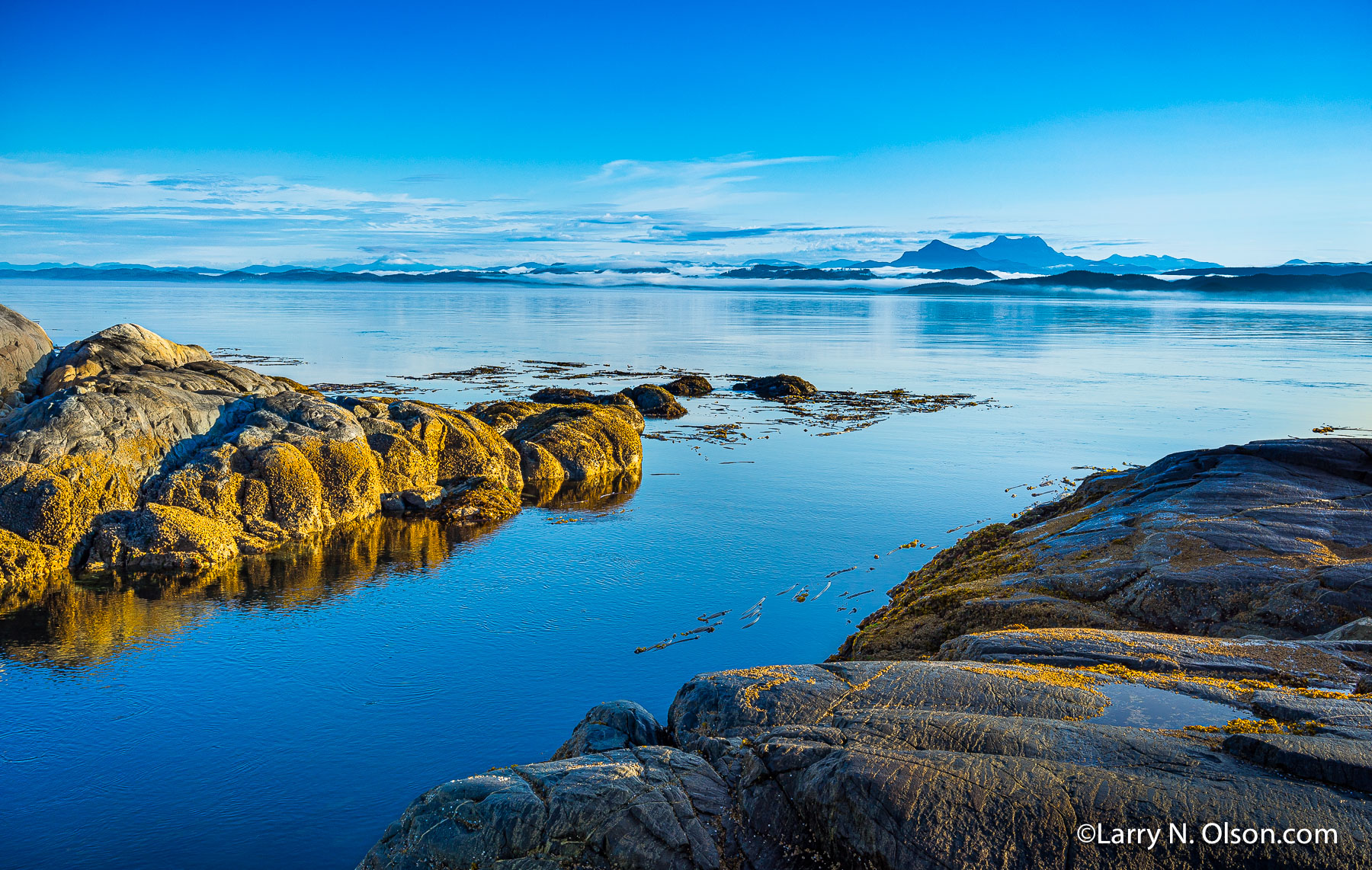 Queen Charlotte Sound, Broughton Archipelago, BC | The ocean is calm in the  Broughton Archipelago at dawn.