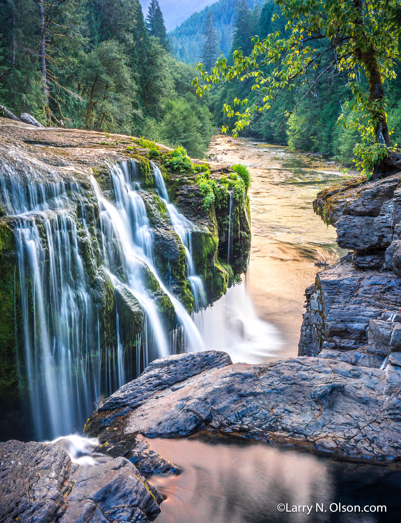 Lower Lewis River Falls #2, WA | The forest fires had changed the skies to a errie color at sunset and is reflected in river.