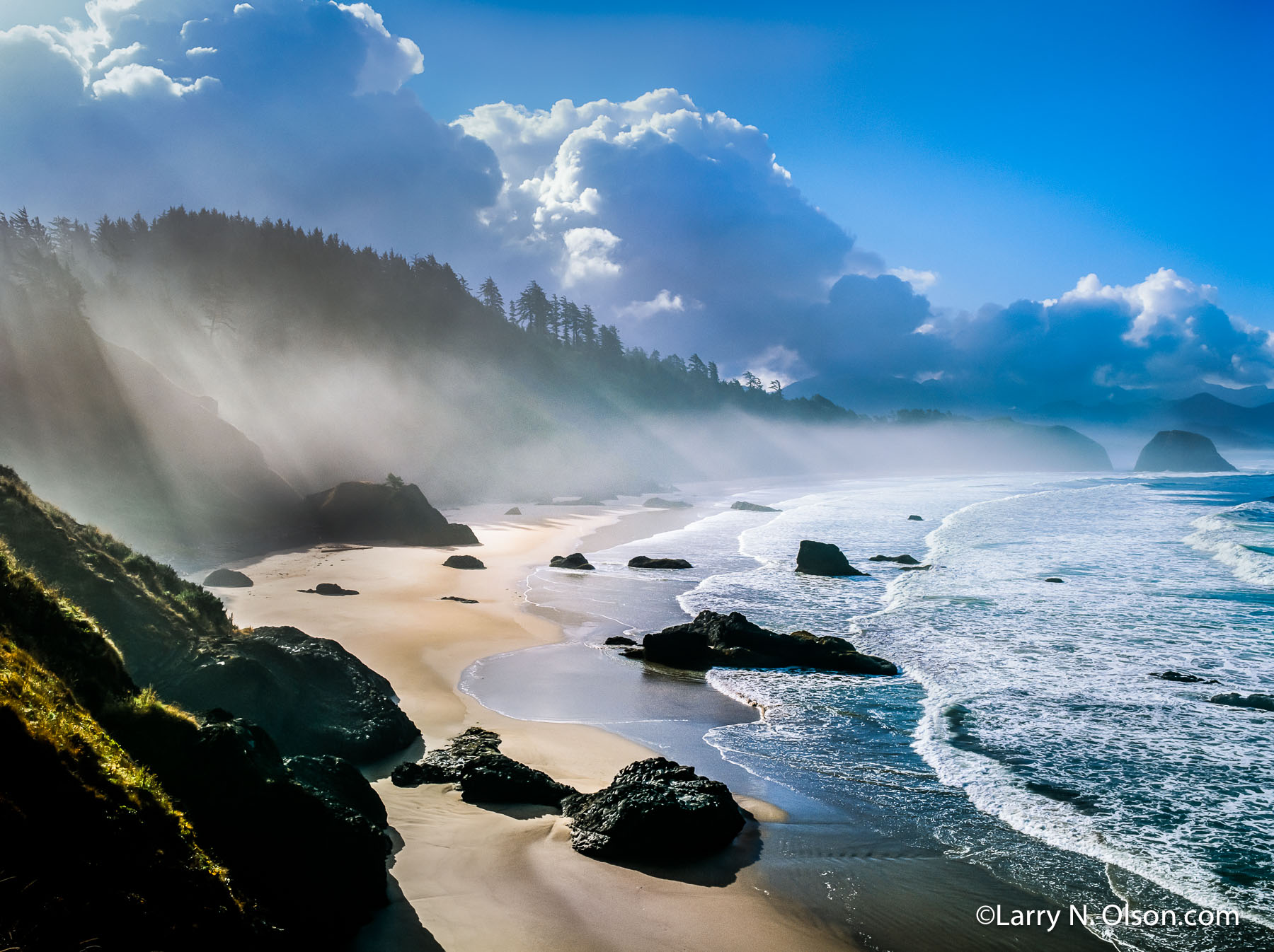 Crescent Beach #3, Ecola State Park, OR. | Dramatic light illuminates the clouds, and beach while surf rolls onto the shore at low tide.