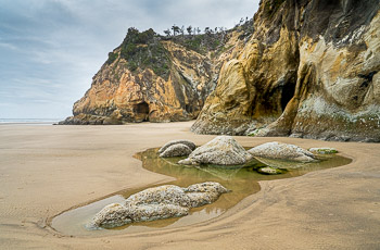 Hug Point, OR | Low tide at the sandstone cliffs of Hug Point State Park, OR.
